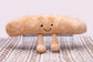 Plush squeaky baguette dog toy